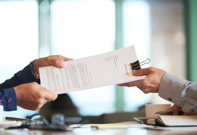 closeup-hands-passing-contract-unrecognizable-businessman