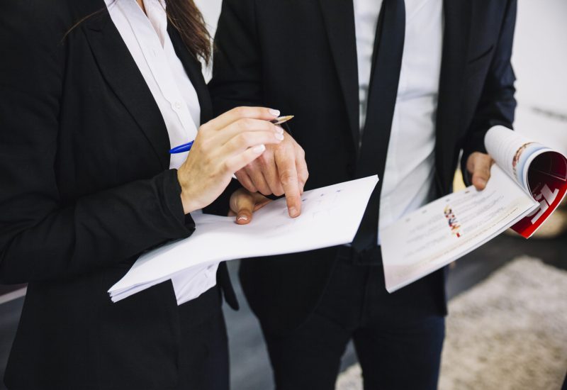 corporate-business-people-with-papers